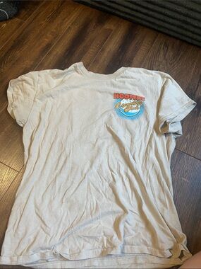 Hooters Cream Tee with Orange and Blue Logo